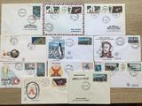 many different types of stamps on this table