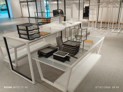 a table with a lot of items on it in a room