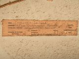 a label on the wall of a building that says, schaudt douglas