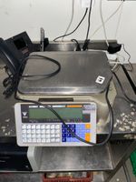 Une balance étiqueteuse en inox DIGI SM5100 (photo 2)