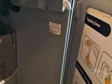a metal box with instructions on the inside of it