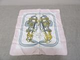 an image of a white and blue square scarf with a gold and blue design