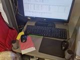 a laptop computer sitting on top of a bed