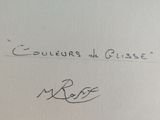 a close up of a piece of paper with a handwriting on it
