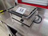 a machine that has a number on it sitting on a counter