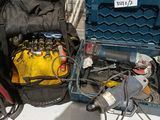 a tool box with tools and a tool bag on a table