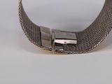 a silver bracelet with a metal clasp on it