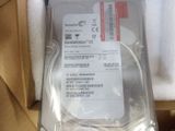 a hard drive in a box with a sticker on it