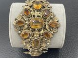 a close up of a ring on a display stand