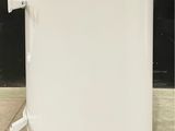 an image of a large white tank with a handle