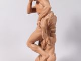 statue of a man with a monkey on his shoulder