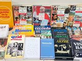a lot of books that are sitting on a table