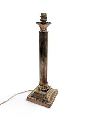 an image of a lamp that is on top of a table
