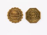 two gold coins with the date of the 20th century and the date of the 20th century