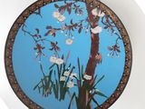 a picture of a plate with a painting of a tree on it