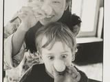 a black and white photo of a woman and a child