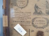a picture of an old wooden box with a label on it