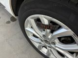 a close up of a tire with a sticker on it