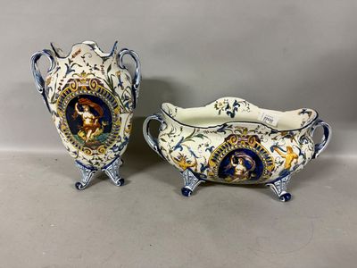 two blue and white vases with a picture of a woman on them