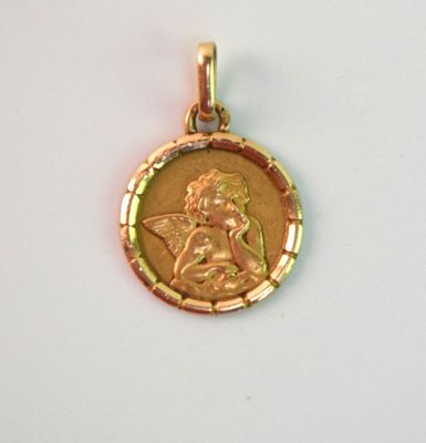 une image représentant une pièce d'or sur laquelle figure un petit ange