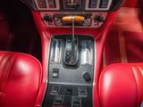 an image of a car dashboard with red leather seats