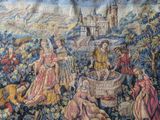 an image of a tapestry with a picture of a group of people in a field