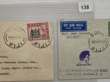 two old envelopes with stamps are on display in a glass case
