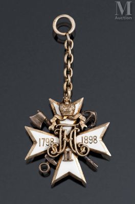 an image of a cross with a crown on it on a black background