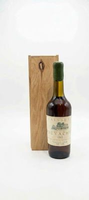 an image of a bottle of wine sitting next to a wooden box