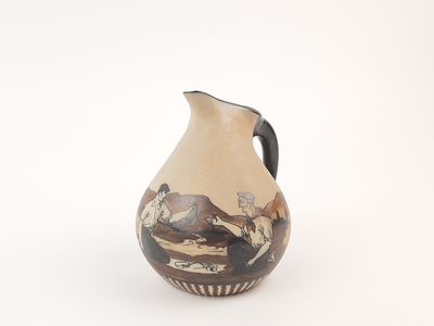 a small vase with a painting on it on a white surface