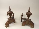 pair of antique cast iron candlesticks with carved wood bases