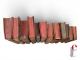 a row of old books on a shelf on a white background