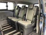 four seats in the back of a van that are empty