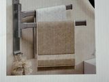 a picture of a picture of a bathroom with a towel rack
