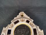 a clock that is sitting on top of a table