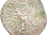 an old silver coin with a cross on it