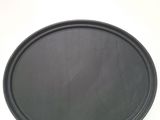 a black tray with a black lid sitting on a white surface
