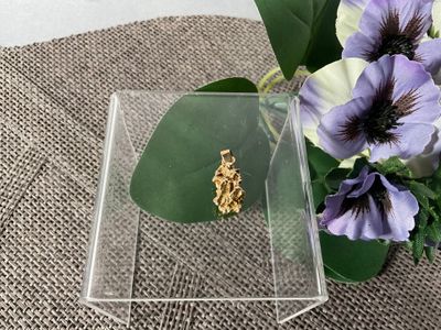 Pendentif "Pépite" en or jaune 18K