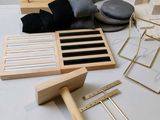 several pieces of wood are laid out on a white surface