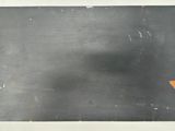 a picture of a picture of a blackboard on the wall
