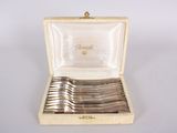 a box of silverware that is sitting on a table
