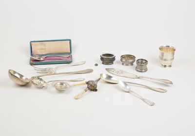 several silverware items including spoons, cups, and a box