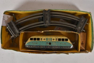 a toy train set in a box on a table