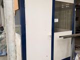 an image of a white and blue cabinet in a garage
