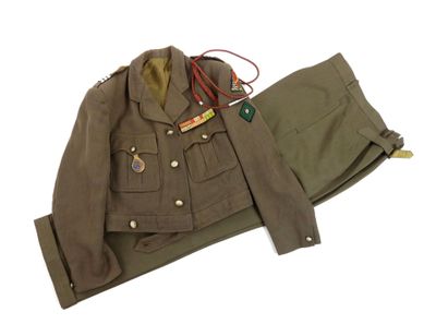 an image of a military jacket and pants on a white background