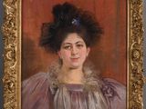 portrait of a woman in a purple dress with a blue flower in her hair