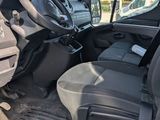 a picture of the inside of a truck with the driver ' s seat down