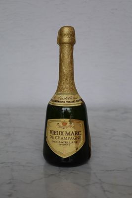 a bottle of wine that is sitting on a table