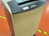 an image of a paper shredder sitting on the floor in a room