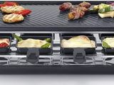 an image of a grill with several different types of food on it